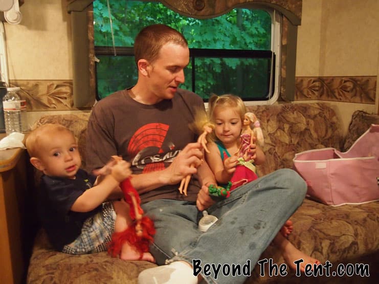 Door County Family Camping Trip - Part 1 5 Rainy Morning Game. Isaiah is not playing "Barbie" he is smashing her with a Teenage Mutant Ninja Turtle (see video for proof).