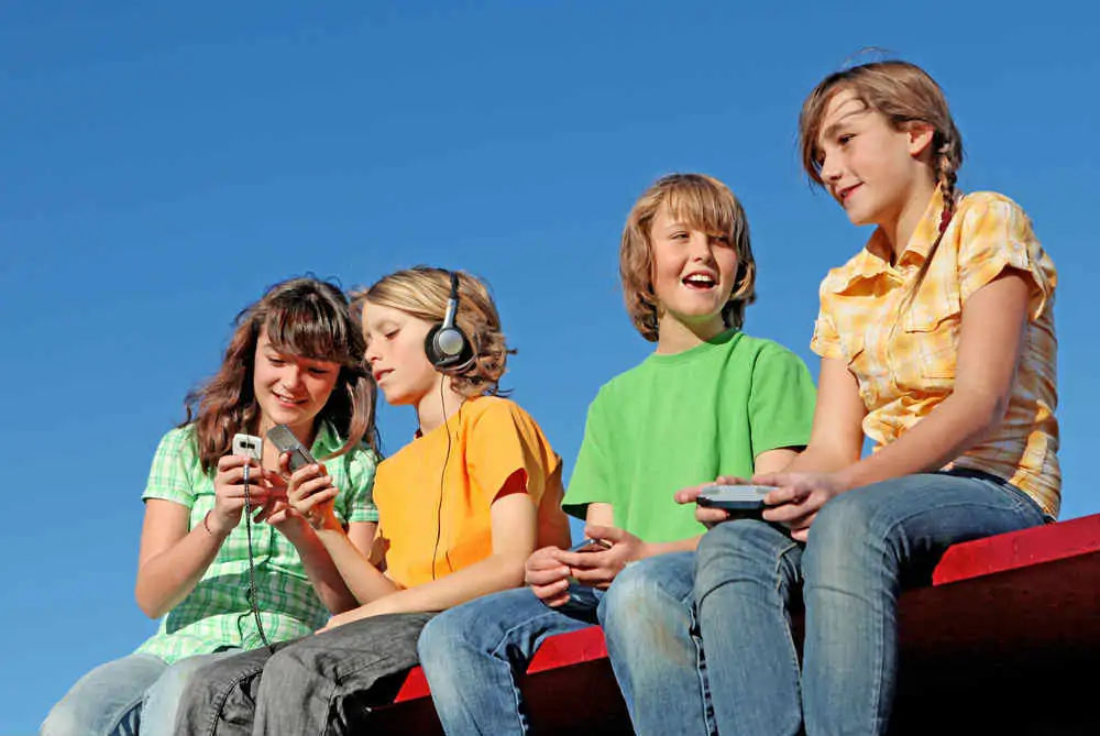 9 Camping Myths Debunked 1 Kids on electronics