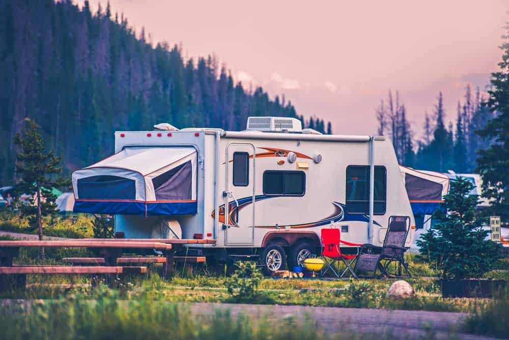 RV Meal Planning 101 1 RV camping at a campground in the woods.