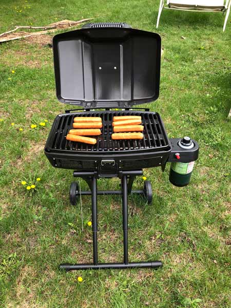 Cooking brats on the Coleman Sportster Grill