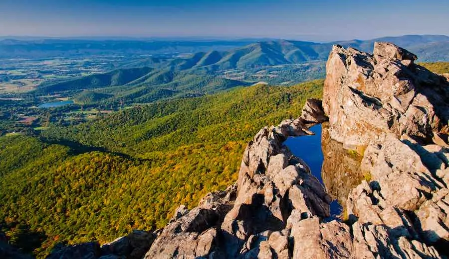 40 of the Best Places To Go Camping In Virginia 11 Mountain peak with a small pool of water at Shenandoah National Park