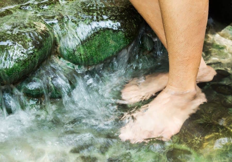 Feet Soaking in Natural Hot Springs in Idaho