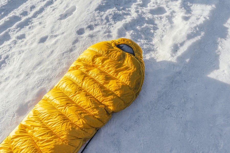 Yellow Winter Sleeping Bag on Snow