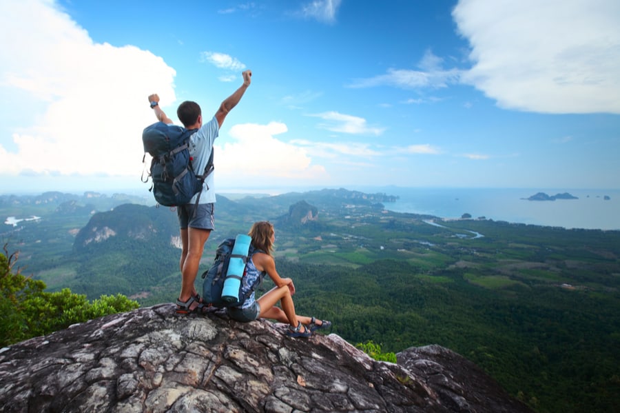 How to Plan a Backpacking Trip in 2020 6 Couple Backpacking Overlooking Ocean