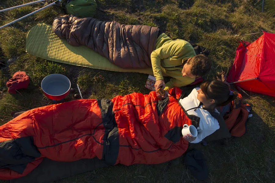 How to Wash a Sleeping Bag (And Store It After!) 1 People Laying in a Sleeping Bag
