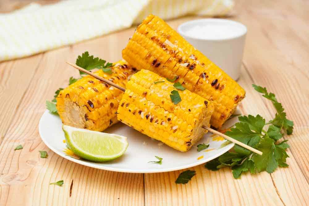 35 Easy Dutch Oven Camping Recipes 5 Cooked corn on the cob