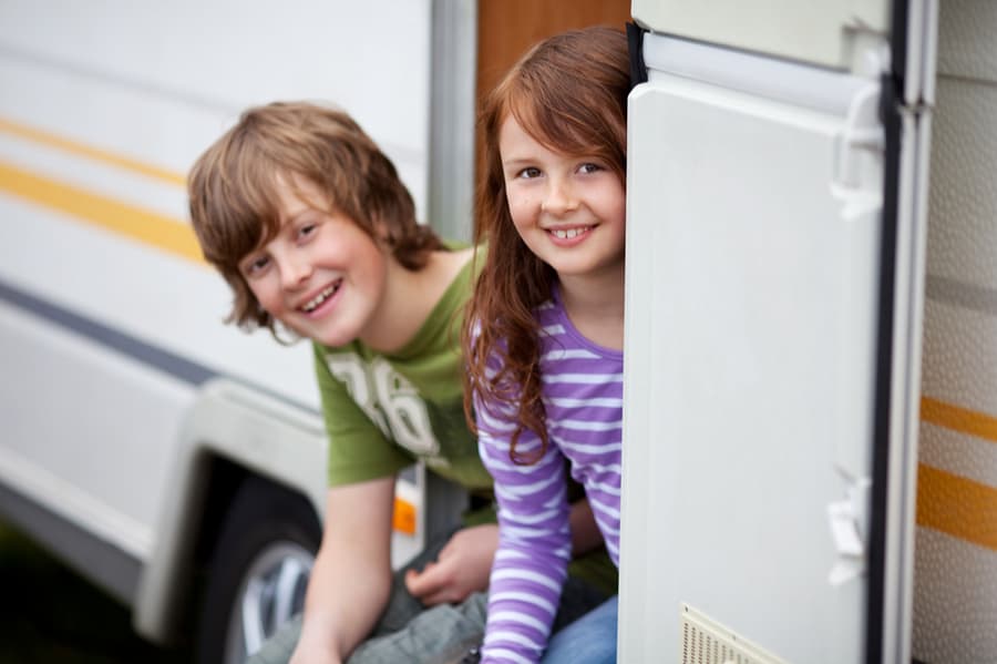 Kids Sitting Inside of RV