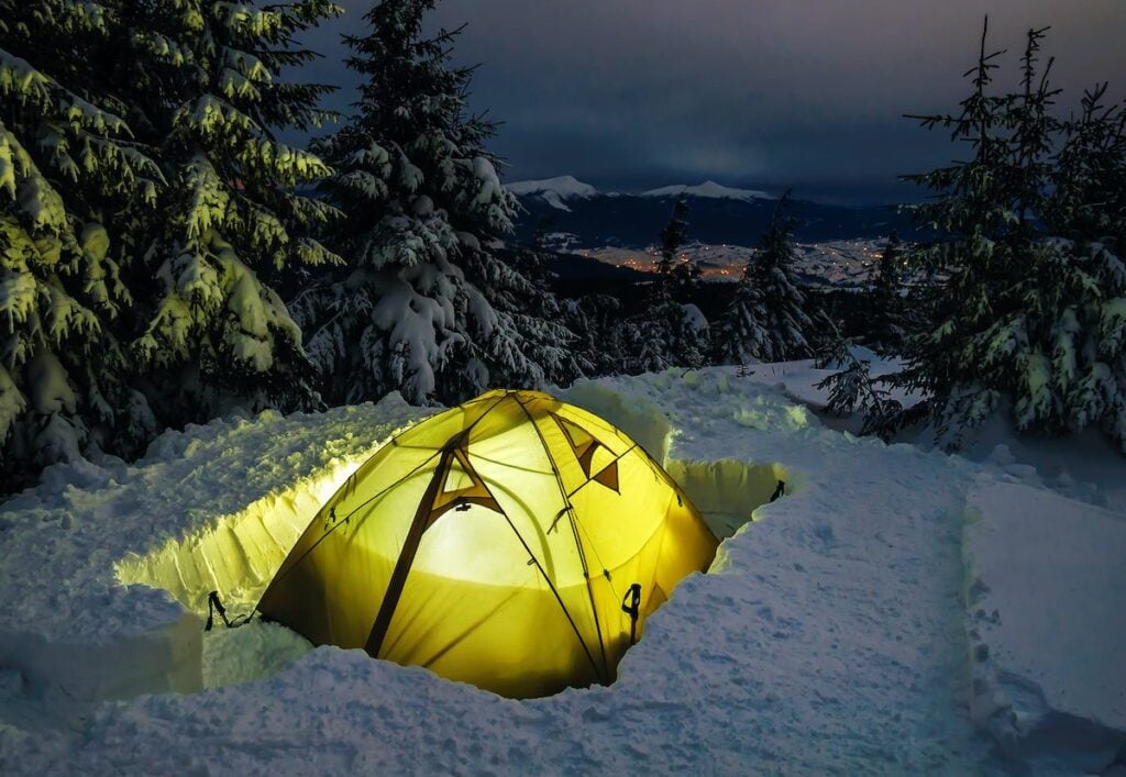 How To Insulate A Tent For Winter Camping 3 Winter camping, night, shining green tent on snow,