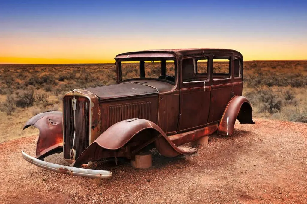 Petrified Forest National Park Camping: 9 Essential Tips & More 10 An old car body near the entrance of Petrified Forest Natinal Park.
