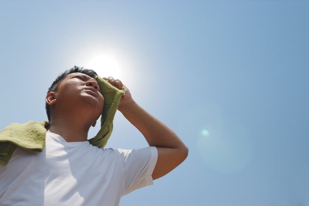 Man appearing to be suffering from heat exhaustion.