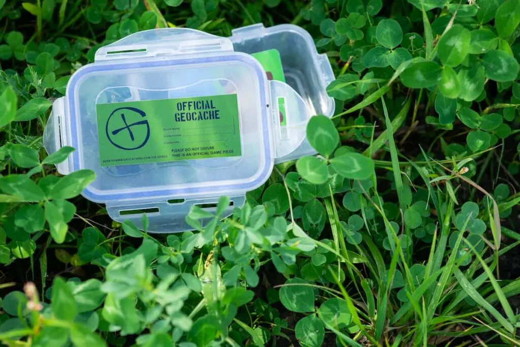 A Guide to Georgia State Parks Camping 7 Two geocache containers on the ground.