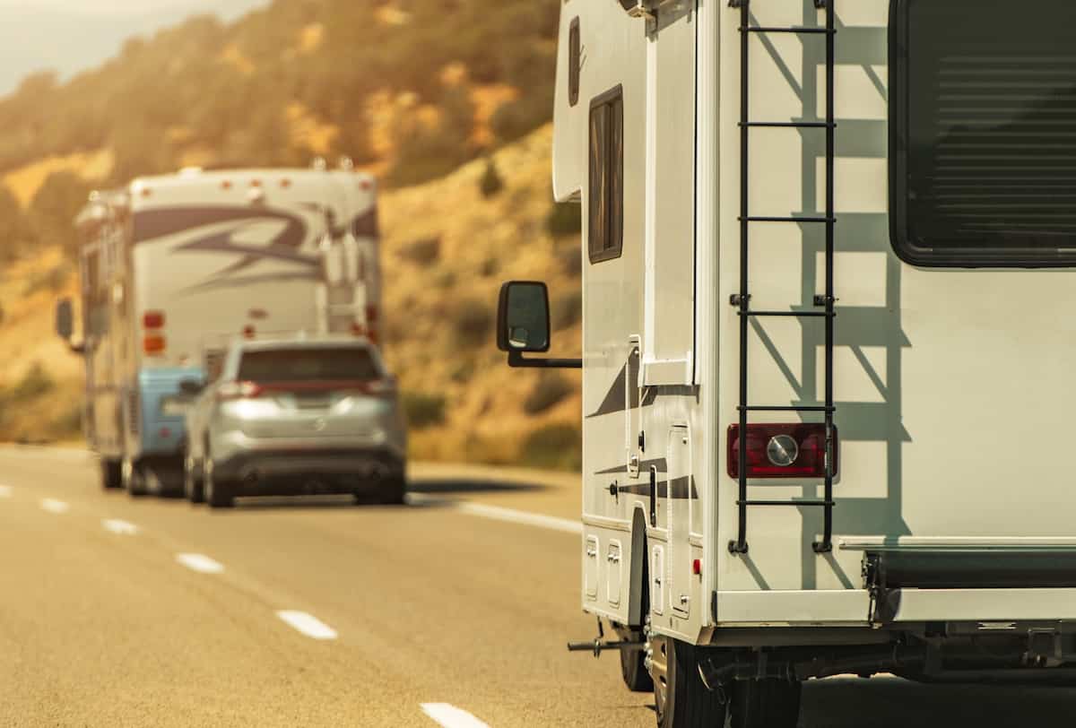 RV Maintenance 101: A Comprehensive Guide to Keeping Your Home on Wheels in Top Shape 11 Two RVs on the highway.