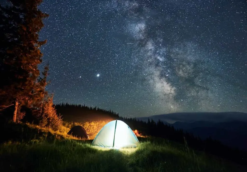 Nantahala National Forest Camping Guide 5 A remote tent campsite in the mountains under the stars at night.