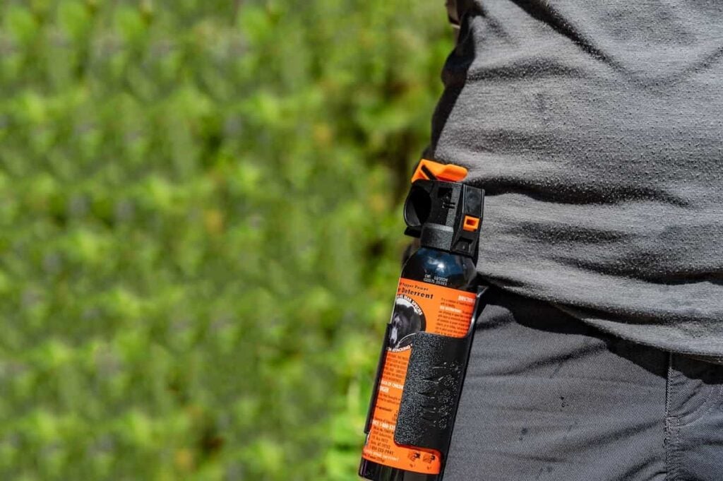 How to Use Bear Spray and Stay Safe From Bears 3 A belt holster for carrying a can of bear spray.