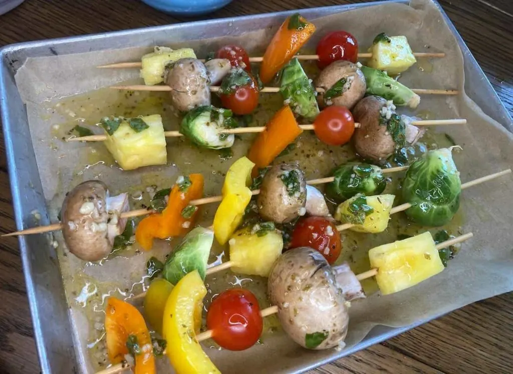 Grilled Veggie Kabobs: A Colorful and Healthy Camping Side Dish 12 Kabobs fully coated and resting in marinade.
