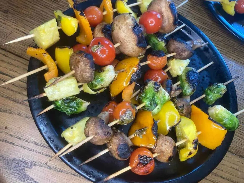 Grilled Veggie Kabobs: A Colorful and Healthy Camping Side Dish 14 A plate of finished grilled veggie kabobs.
