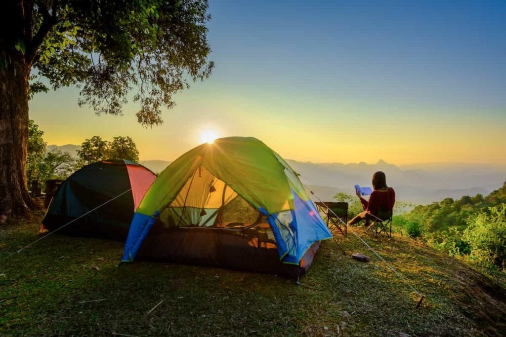 8 Tips for Finding the Perfect Campsite 1 A tent campsite with a mountain vista view. Finding a campsite.