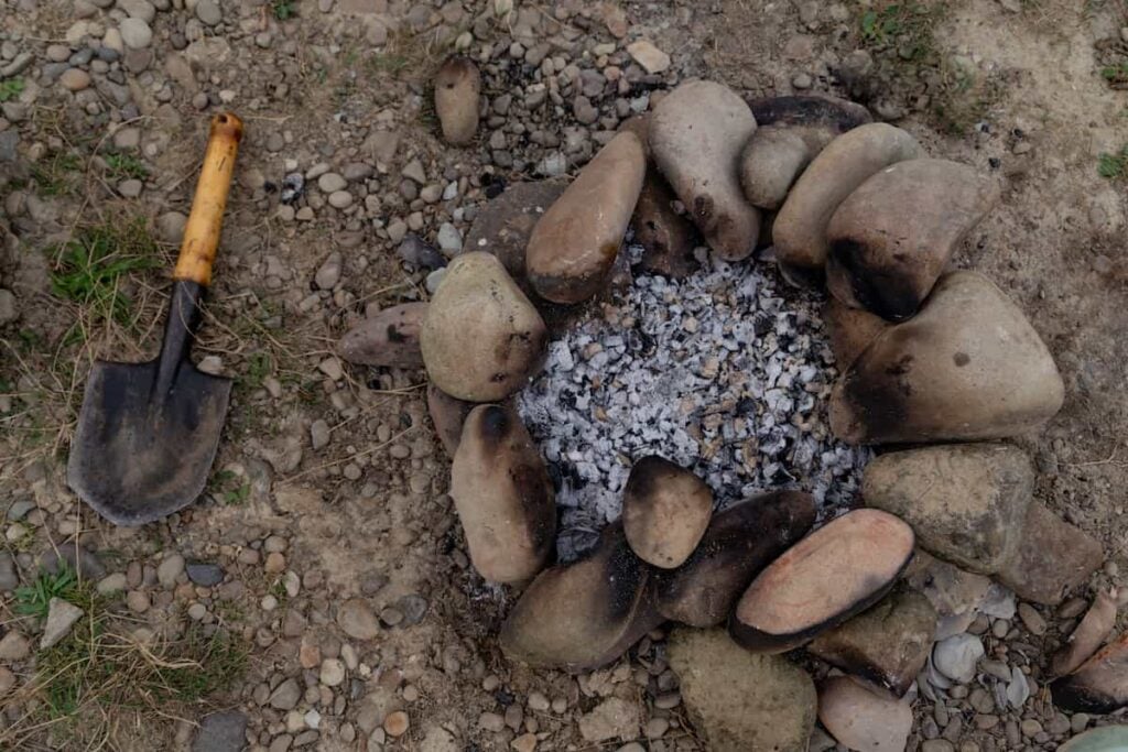 How to Put Out a Campfire 5 Overhead view of campfire ashes.
