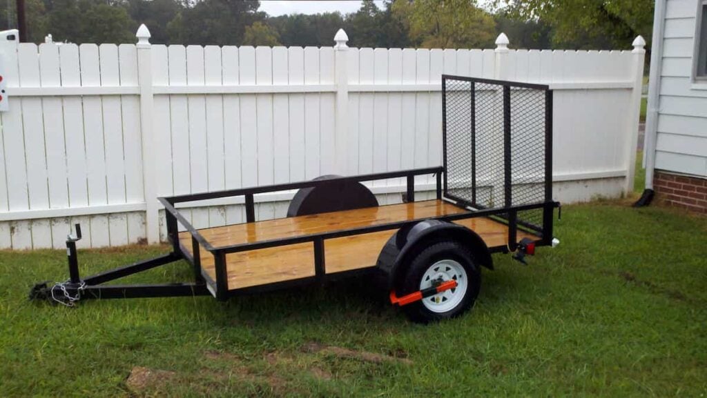 A flatbed utility trailer.