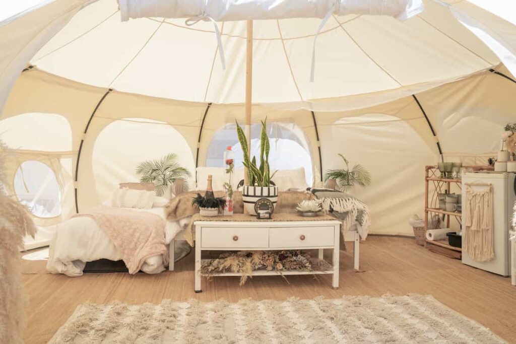 The 13 Best Destinations for Glamping in Arizona 1 Bright interior of a luxurious glamping tent. Best glamping in Arizona.