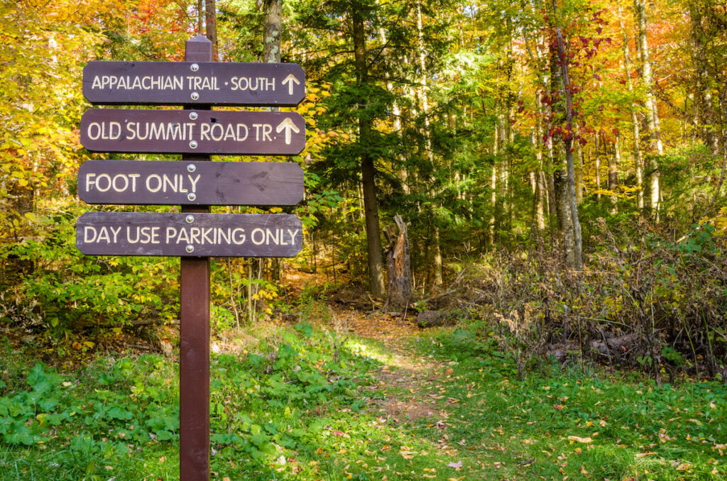 Directional and Information Signas at the Beginning of a Mountain Trail